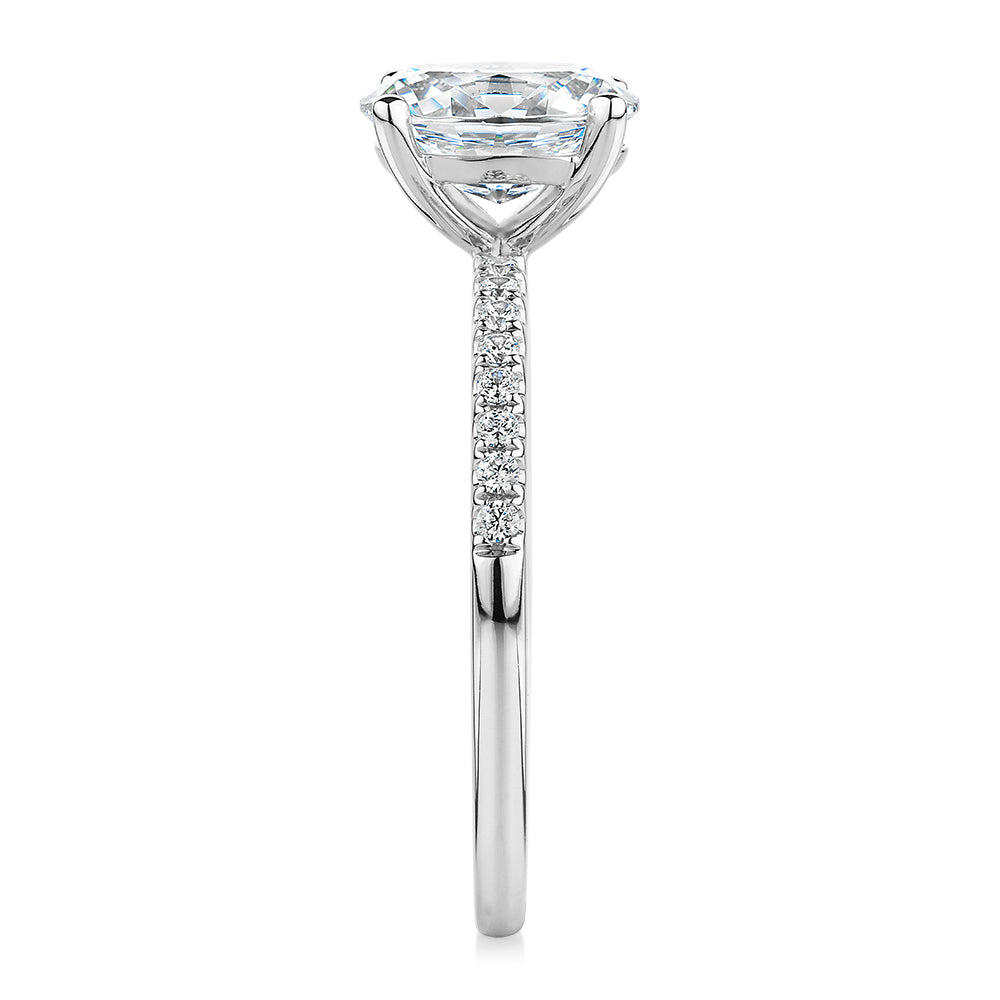 Oval and Round Brilliant shouldered engagement ring with 1.35 carats* of diamond simulants in 14 carat white gold