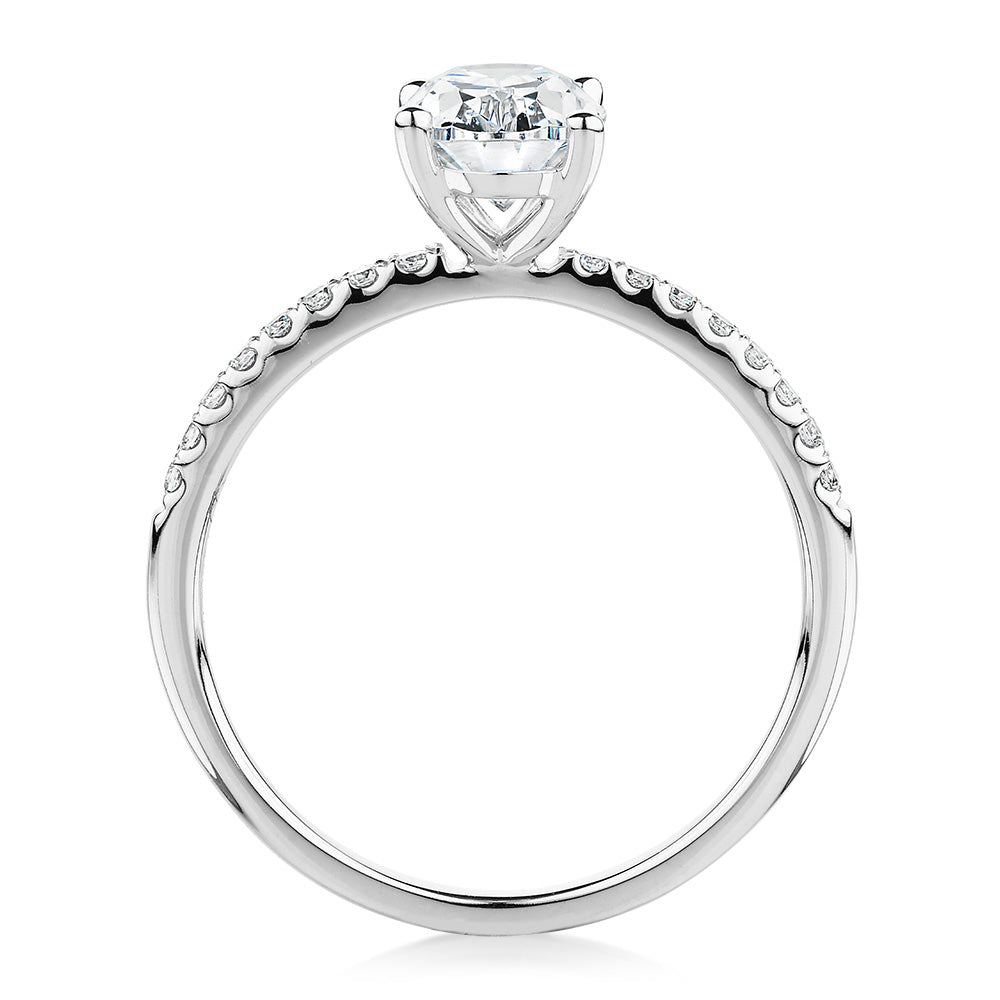 Oval and Round Brilliant shouldered engagement ring with 1.35 carats* of diamond simulants in 14 carat white gold