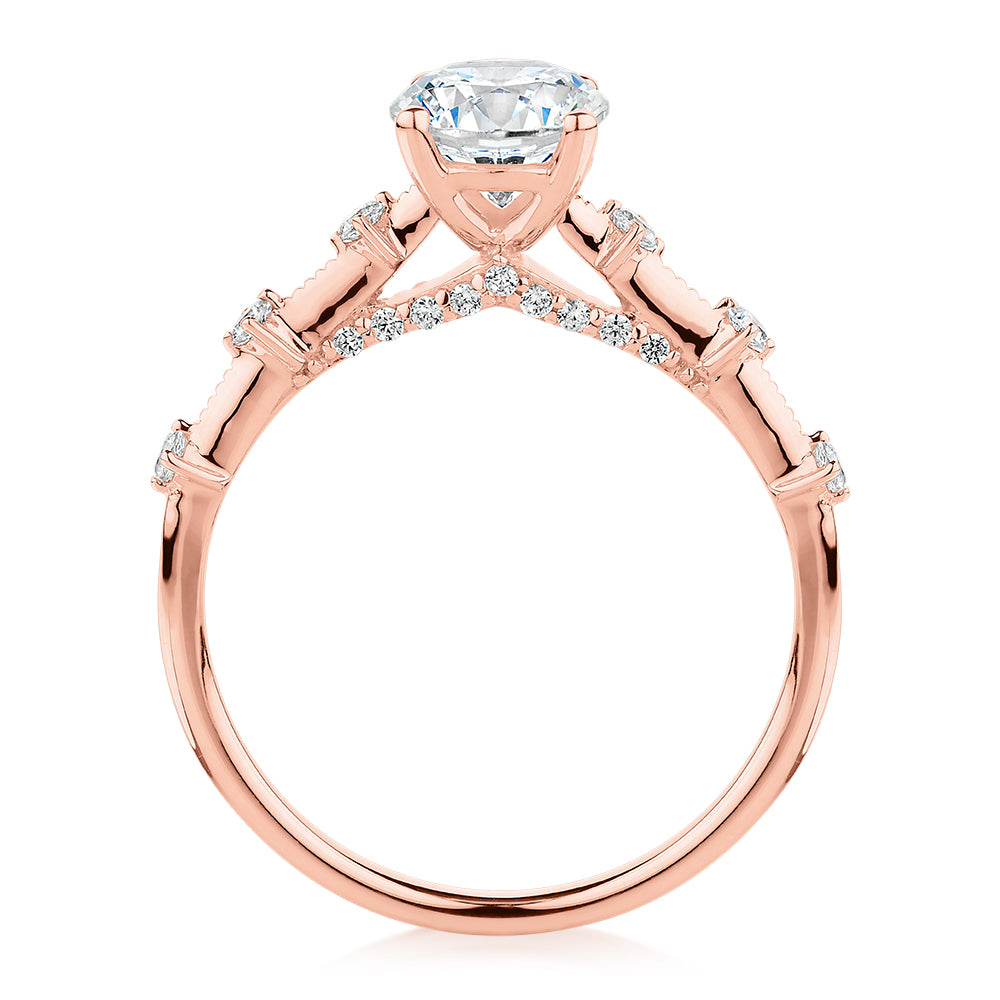 Round Brilliant shouldered engagement ring with 1.20 carats* of diamond simulants in 14 carat rose gold