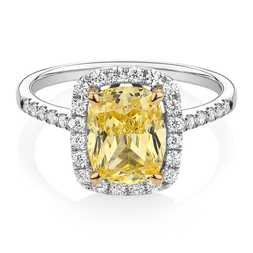 Cushion Radiant and Round Brilliant halo engagement ring with 2.94 carats* of diamond simulants in 10 carat white and yellow gold