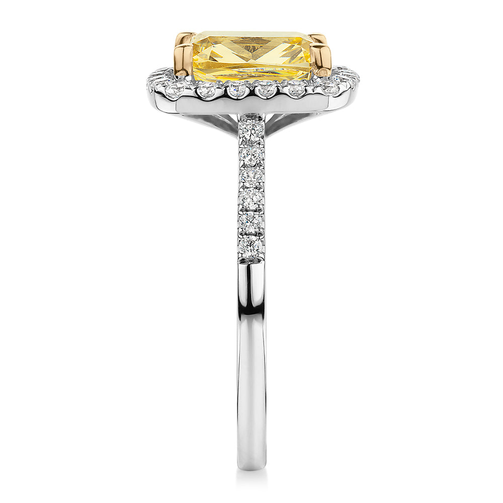 Cushion Radiant and Round Brilliant halo engagement ring with 2.94 carats* of diamond simulants in 10 carat white and yellow gold