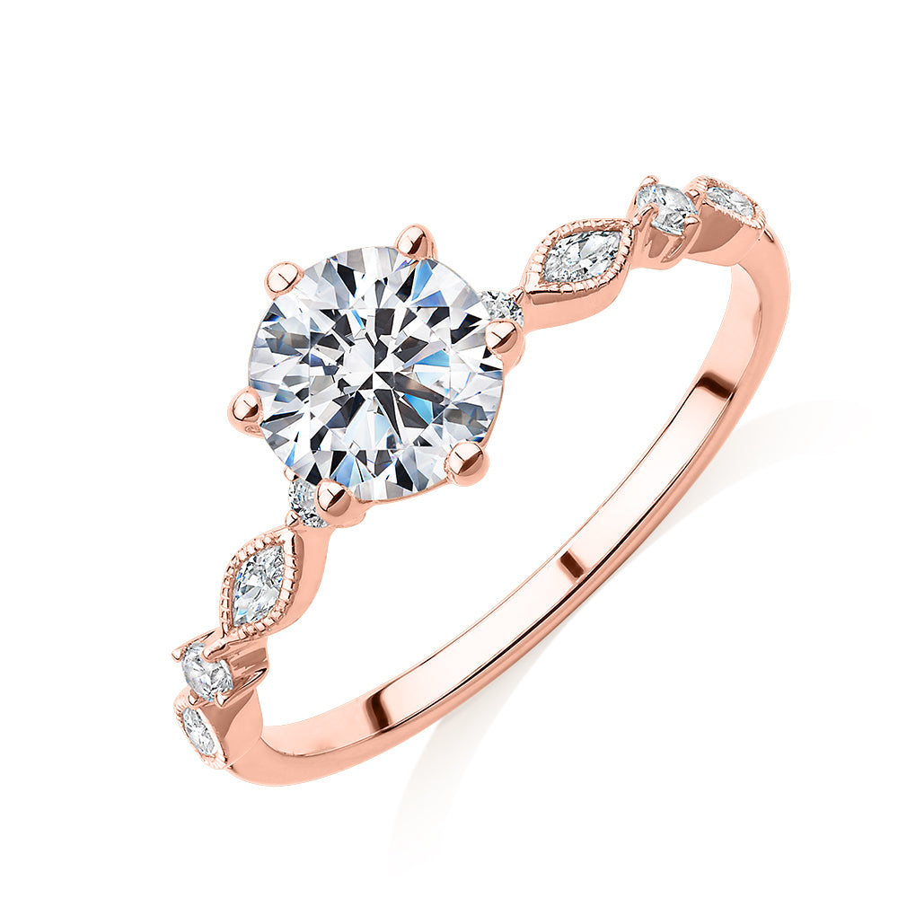 Round Brilliant shouldered engagement ring with 1.19 carats* of diamond simulants in 14 carat rose gold