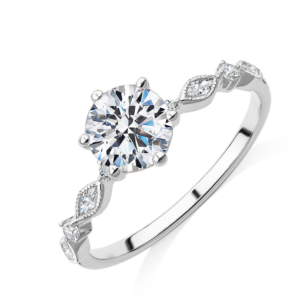 Round Brilliant shouldered engagement ring with 1.19 carats* of diamond simulants in 14 carat white gold