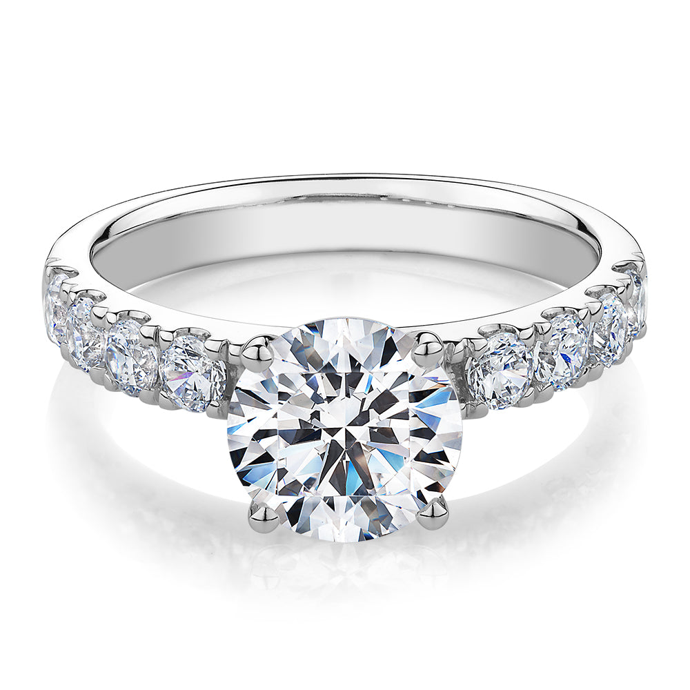 Round Brilliant shouldered engagement ring with 2.68 carats* of diamond simulants in 14 carat white gold