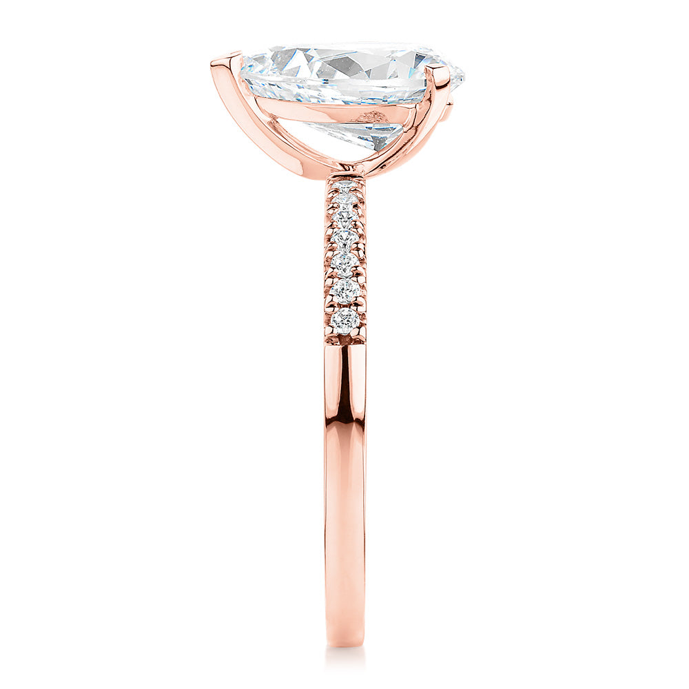 Pear and Round Brilliant shouldered engagement ring with 1.88 carats* of diamond simulants in 14 carat rose gold