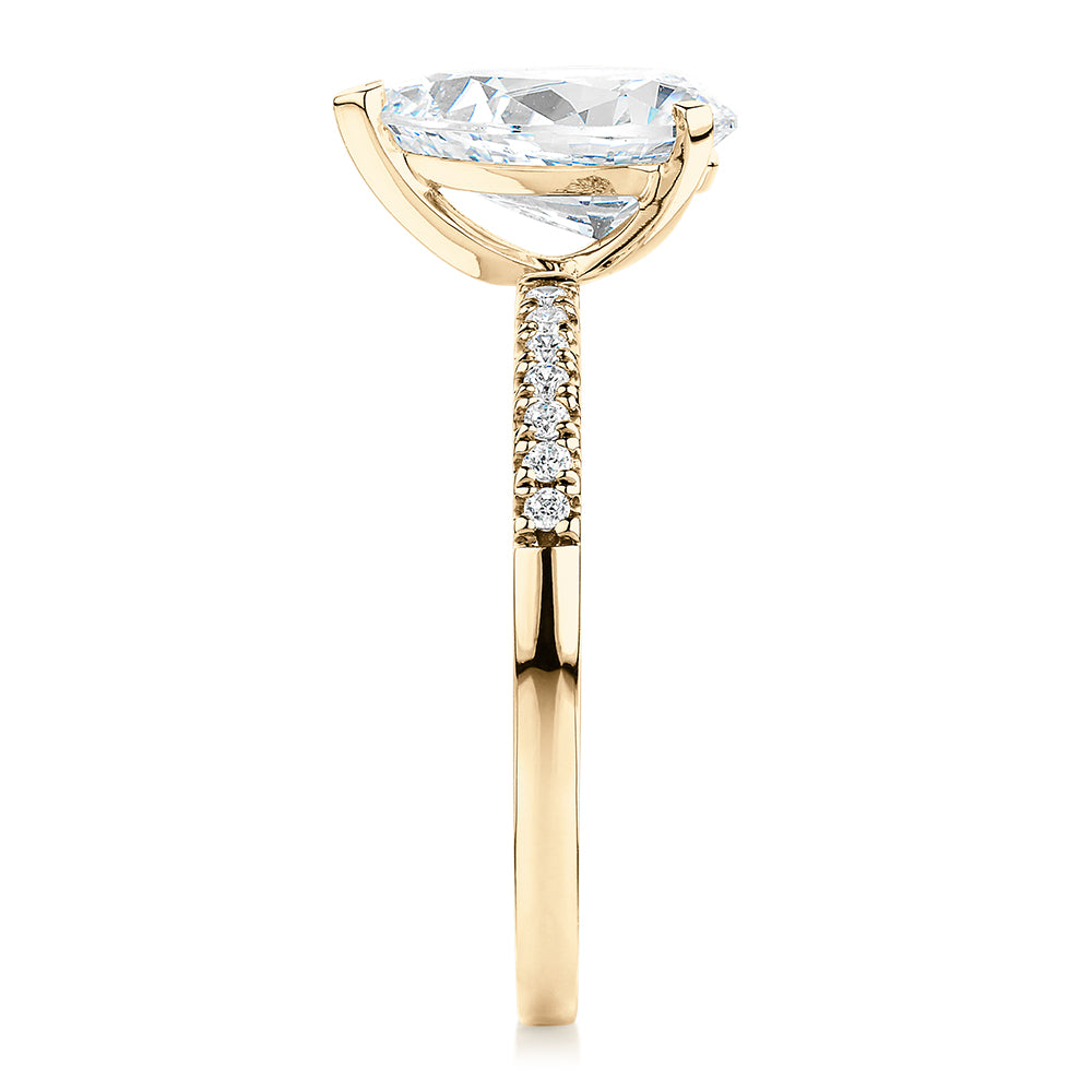 Pear and Round Brilliant shouldered engagement ring with 1.88 carats* of diamond simulants in 14 carat yellow gold
