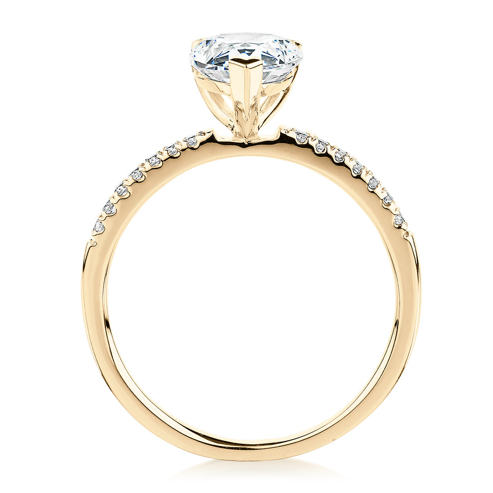 Pear and Round Brilliant shouldered engagement ring with 1.88 carats* of diamond simulants in 14 carat yellow gold