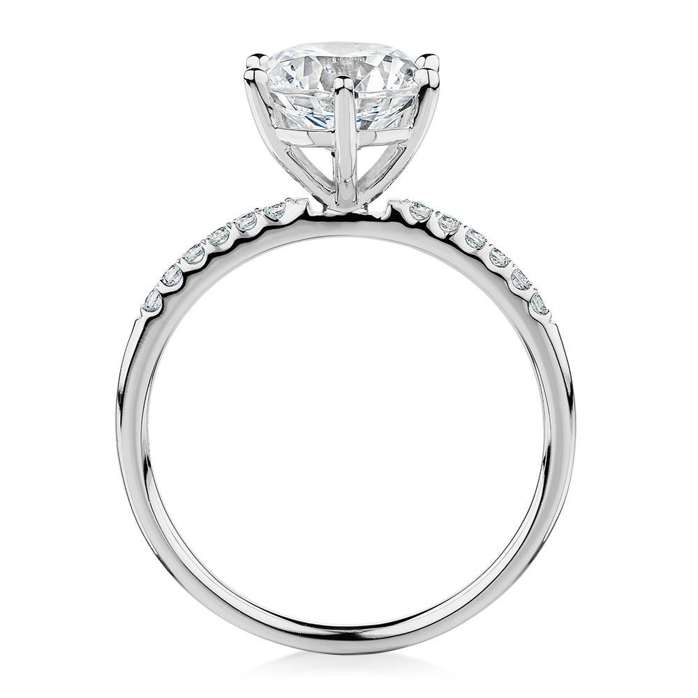Round Brilliant shouldered engagement ring with 2.12 carats* of diamond simulants in 14 carat white gold