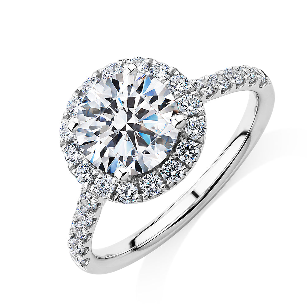 Round Brilliant halo engagement ring with 2.46 carats* of diamond simulants in 10 carat white gold