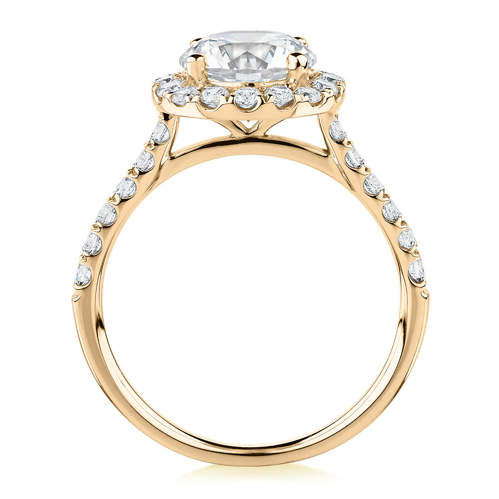 Round Brilliant halo engagement ring with 2.46 carats* of diamond simulants in 10 carat yellow gold