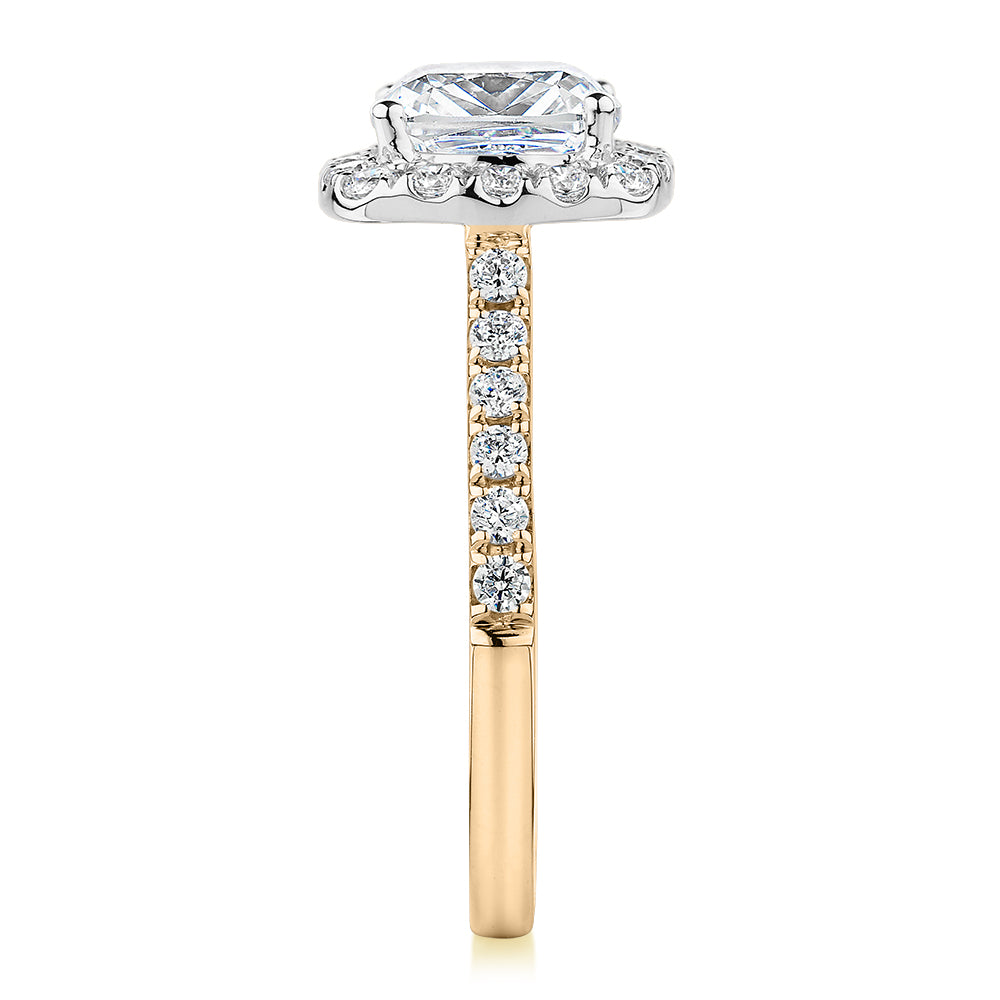 Cushion and Round Brilliant halo engagement ring with 2.09 carats* of diamond simulants in 10 carat yellow and white gold