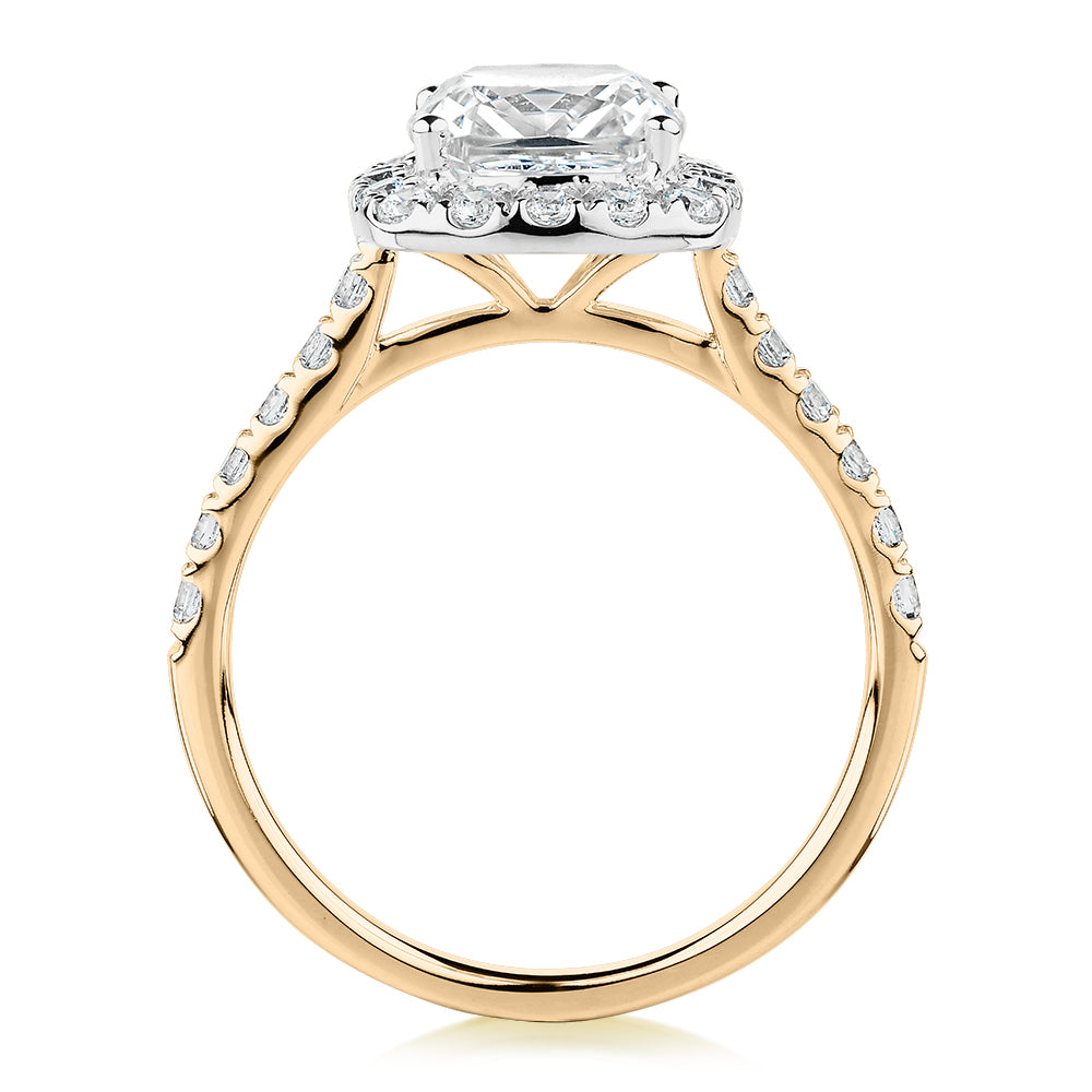 Cushion and Round Brilliant halo engagement ring with 2.09 carats* of diamond simulants in 10 carat yellow and white gold