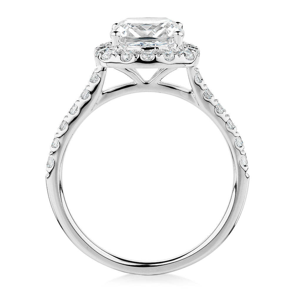 Cushion and Round Brilliant halo engagement ring with 2.09 carats* of diamond simulants in 10 carat white gold