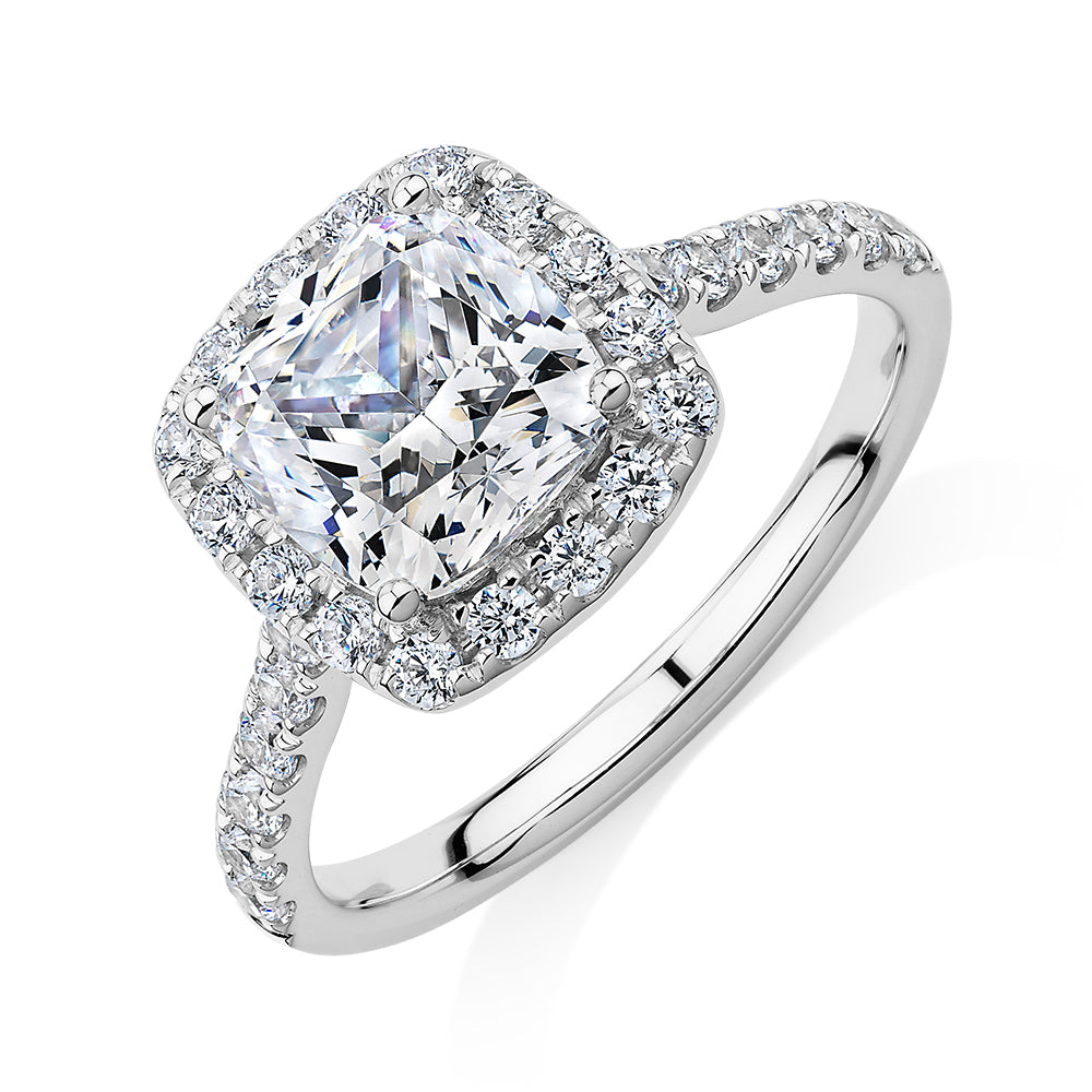 Cushion and Round Brilliant halo engagement ring with 2.09 carats* of diamond simulants in 10 carat white gold