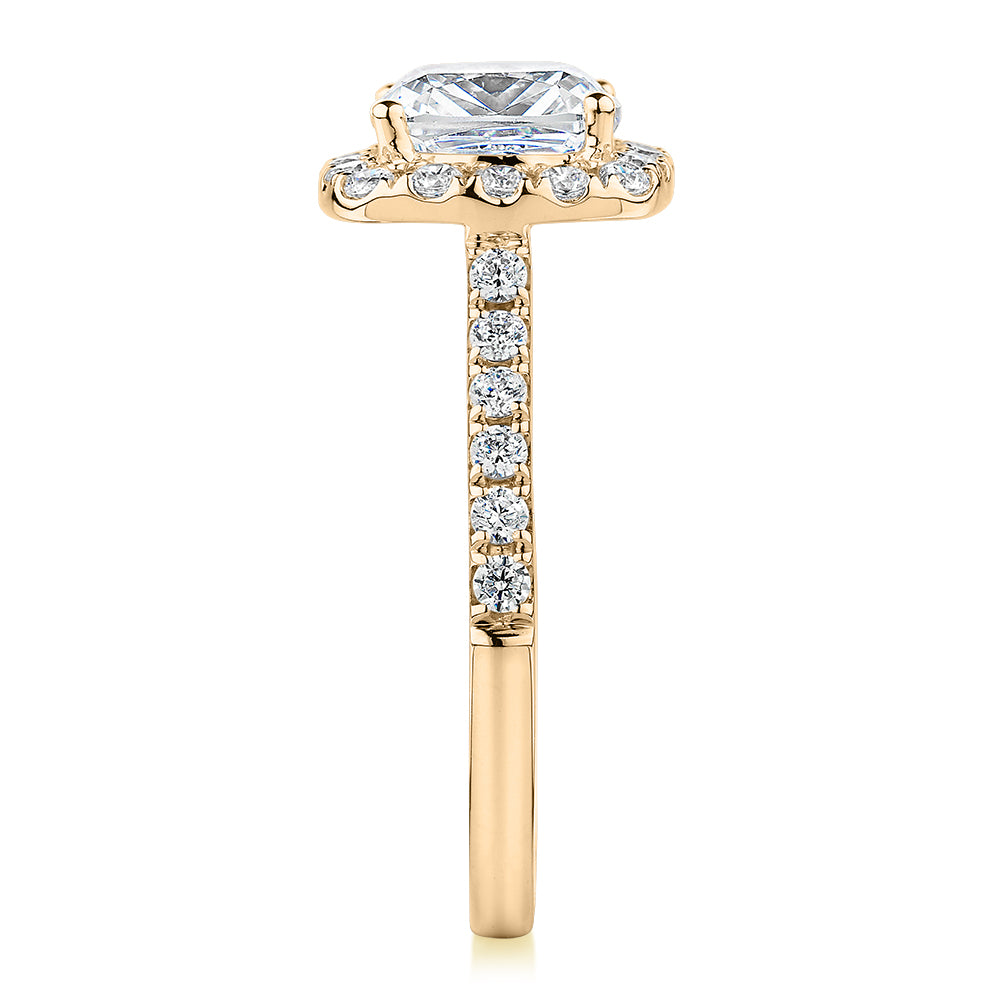 Cushion and Round Brilliant halo engagement ring with 2.09 carats* of diamond simulants in 10 carat yellow gold