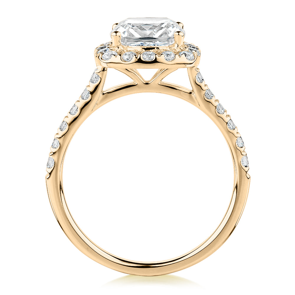 Cushion and Round Brilliant halo engagement ring with 2.09 carats* of diamond simulants in 10 carat yellow gold