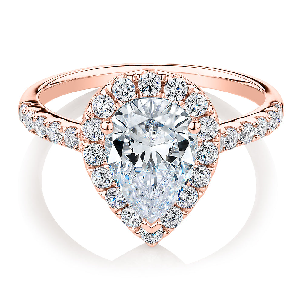 Pear and Round Brilliant halo engagement ring with 2.38 carats* of diamond simulants in 10 carat rose gold