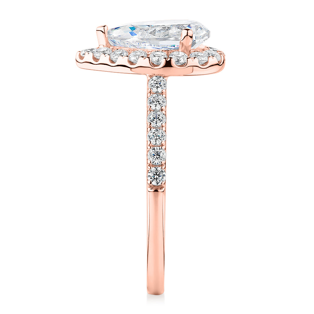 Pear and Round Brilliant halo engagement ring with 2.38 carats* of diamond simulants in 10 carat rose gold