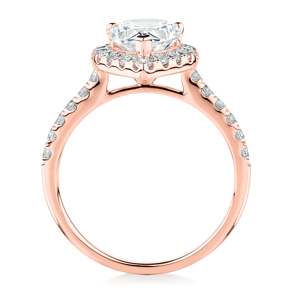 Pear and Round Brilliant halo engagement ring with 2.38 carats* of diamond simulants in 10 carat rose gold