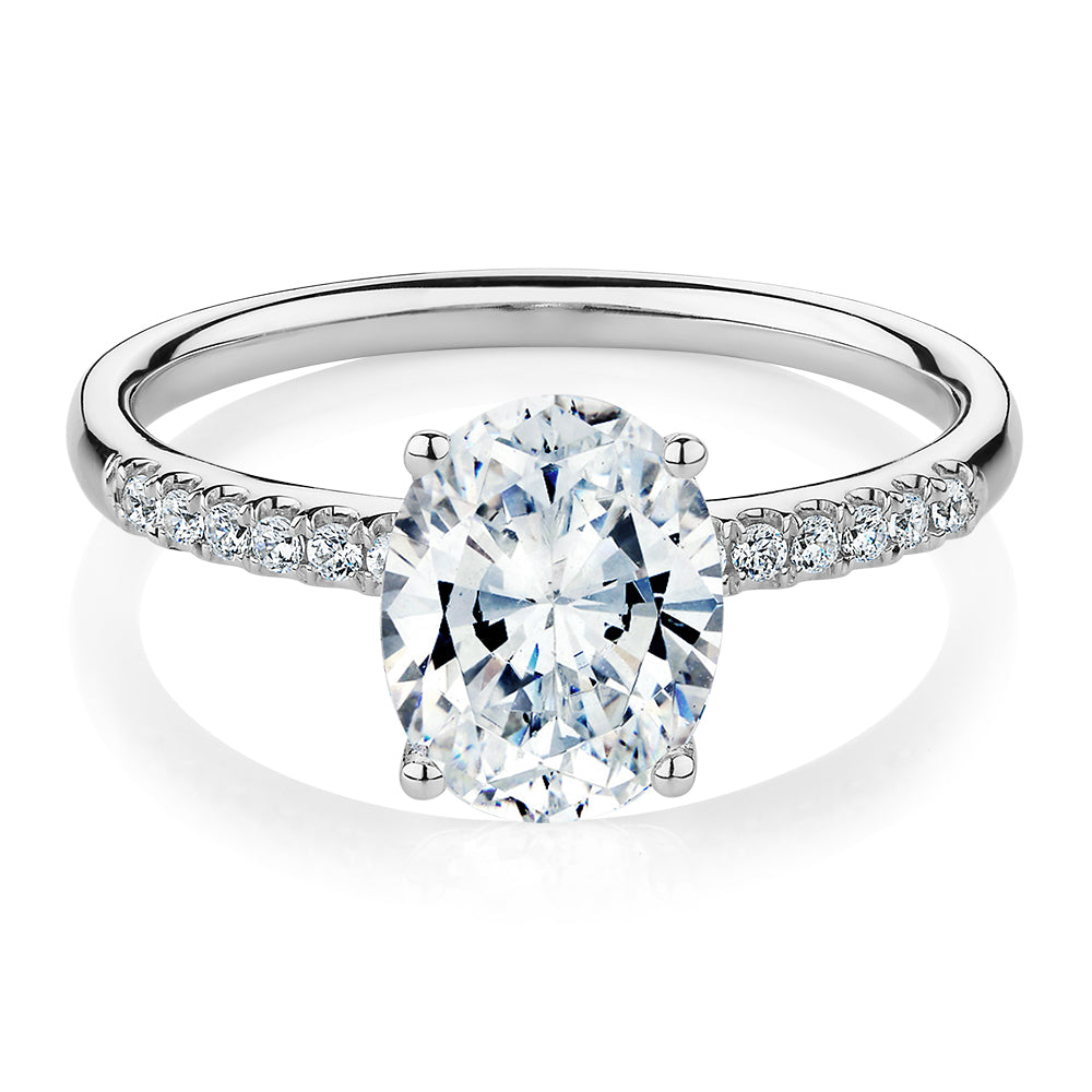 Oval and Round Brilliant shouldered engagement ring with 1.94 carats* of diamond simulants in 14 carat white gold