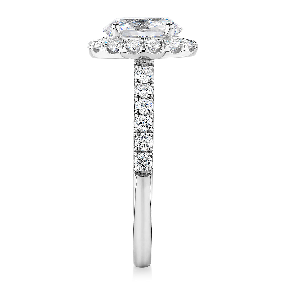 Oval and Round Brilliant halo engagement ring with 1.79 carats* of diamond simulants in 14 carat white gold