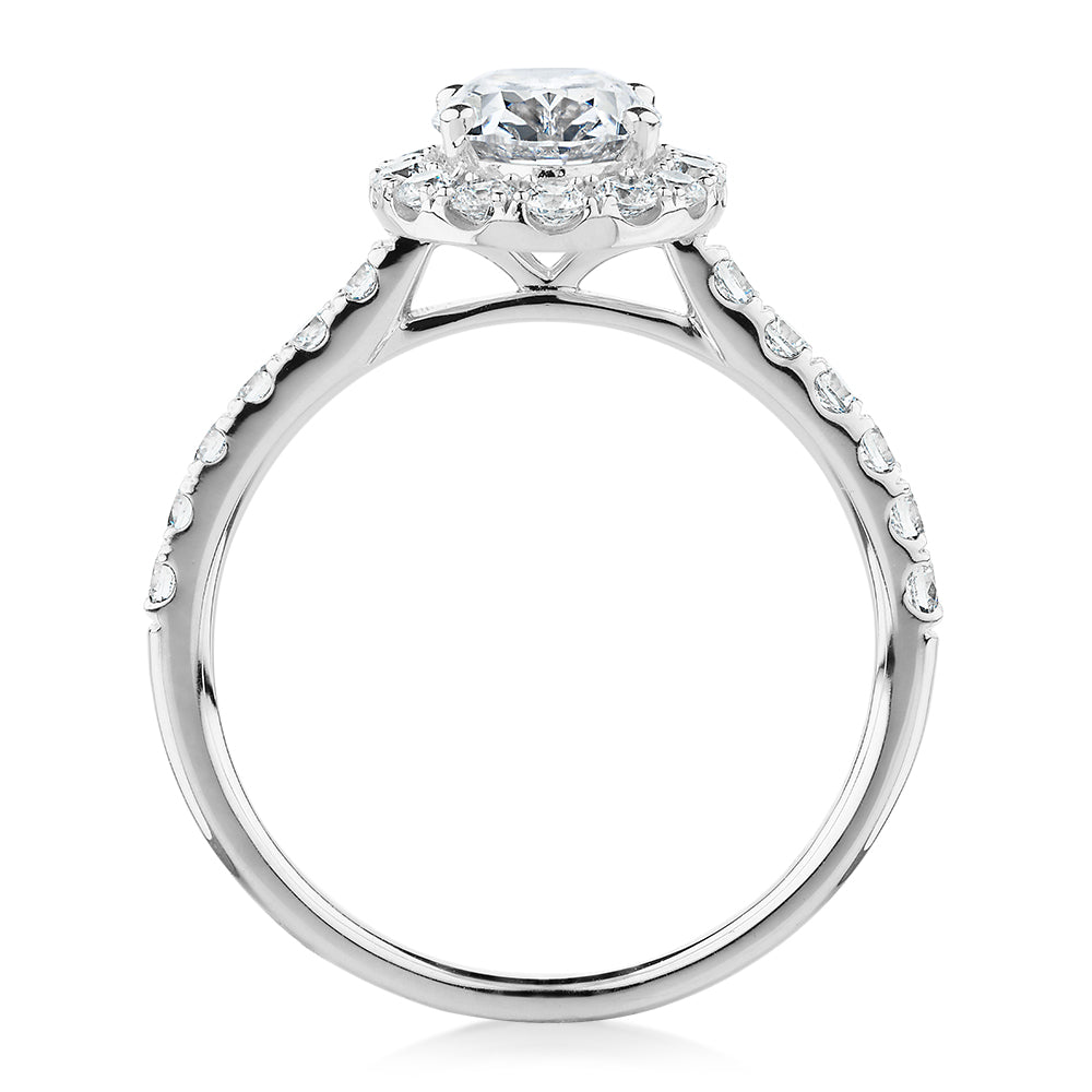 Oval and Round Brilliant halo engagement ring with 1.79 carats* of diamond simulants in 14 carat white gold