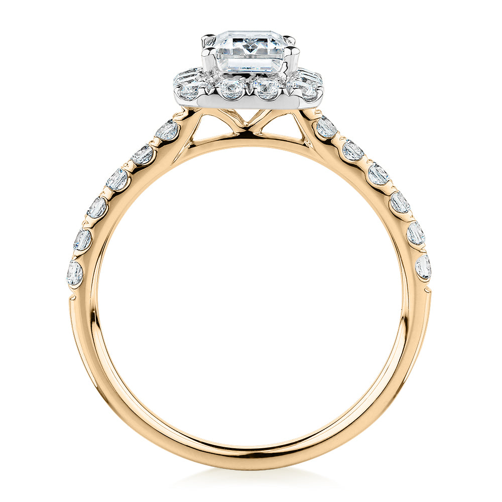 Emerald Cut and Round Brilliant halo engagement ring with 1.65 carats* of diamond simulants in 14 carat yellow and white gold