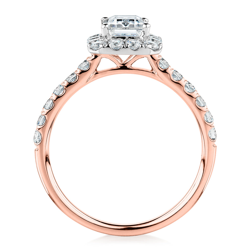 Emerald Cut and Round Brilliant halo engagement ring with 1.65 carats* of diamond simulants in 14 carat rose and white gold
