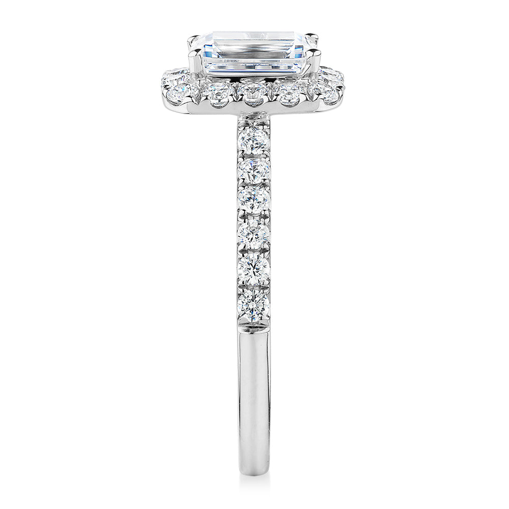 Emerald Cut and Round Brilliant halo engagement ring with 1.65 carats* of diamond simulants in 14 carat white gold