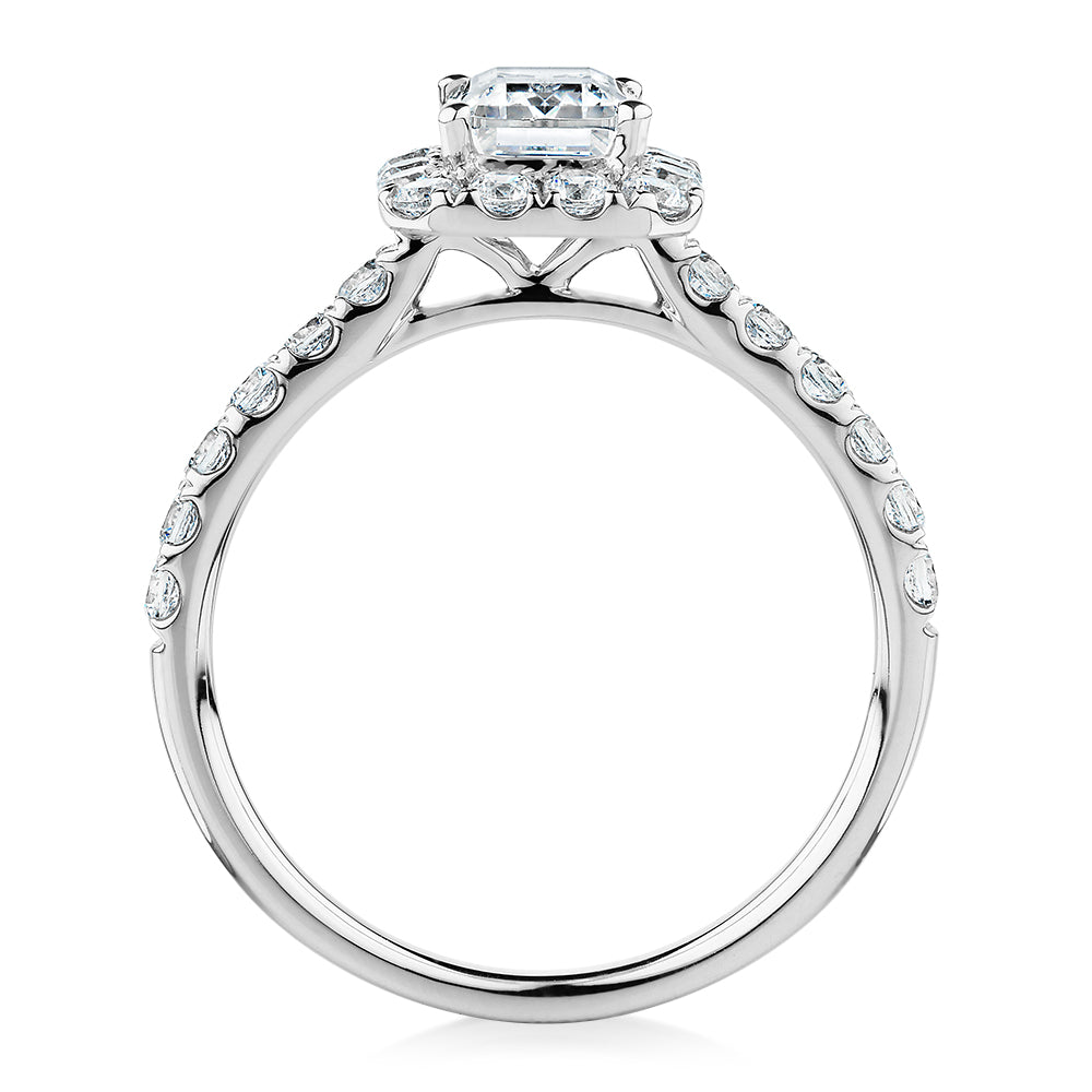 Emerald Cut and Round Brilliant halo engagement ring with 1.65 carats* of diamond simulants in 14 carat white gold