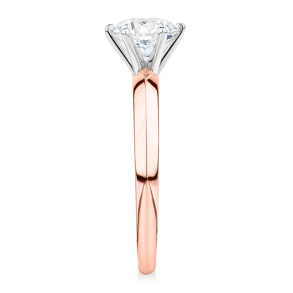 Round Brilliant solitaire engagement ring with 1 carat* diamond simulant in 14 carat rose and white gold
