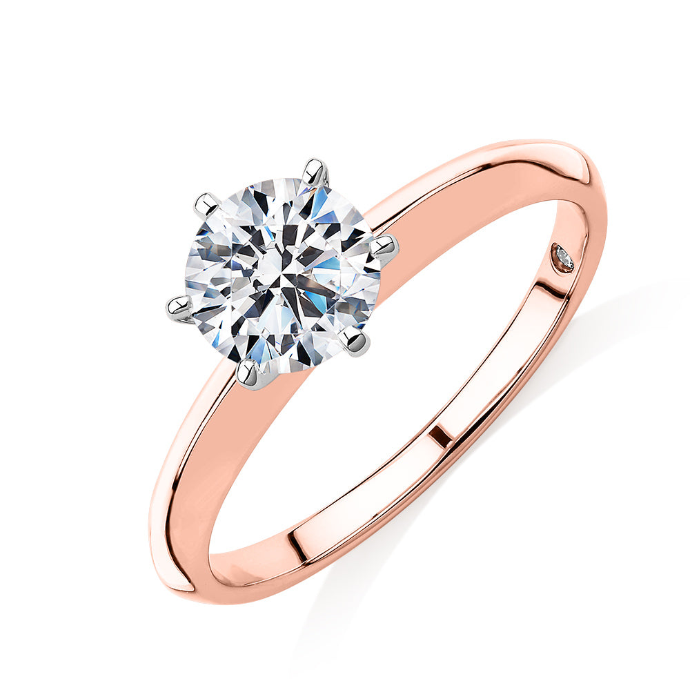 Round Brilliant solitaire engagement ring with 1 carat* diamond simulant in 14 carat rose and white gold