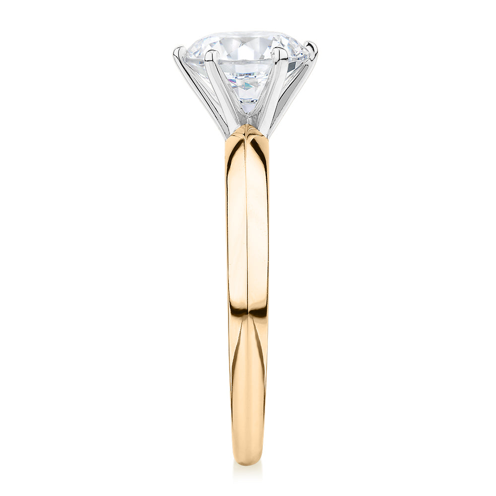 Round Brilliant solitaire engagement ring with 1.5 carat* diamond simulant in 14 carat yellow and white gold