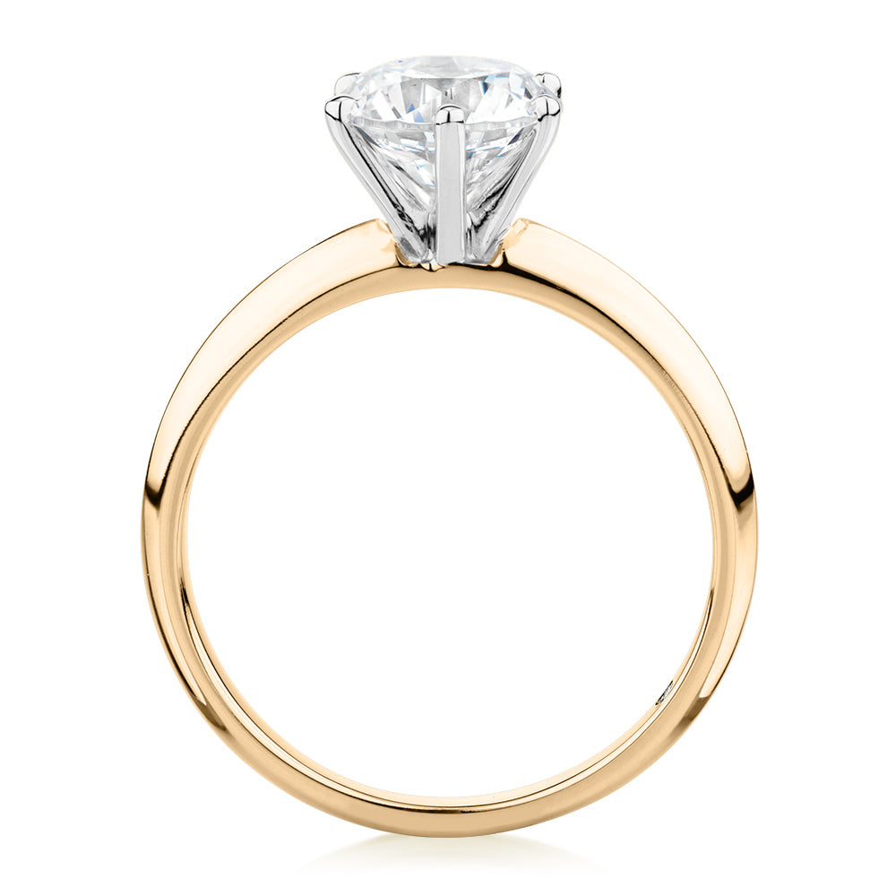Round Brilliant solitaire engagement ring with 1.5 carat* diamond simulant in 14 carat yellow and white gold
