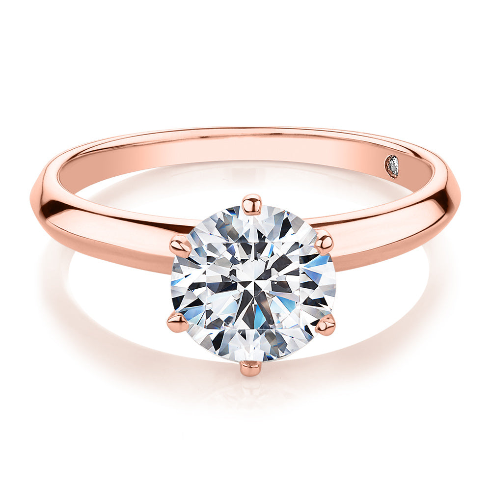 Round Brilliant solitaire engagement ring with 1.5 carat* diamond simulant in 14 carat rose gold