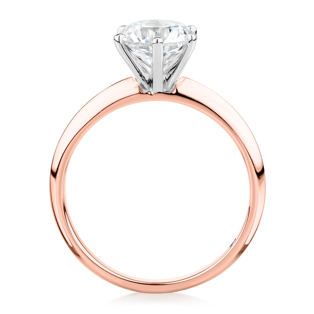Round Brilliant solitaire engagement ring with 1.5 carat* diamond simulant in 14 carat rose and white gold