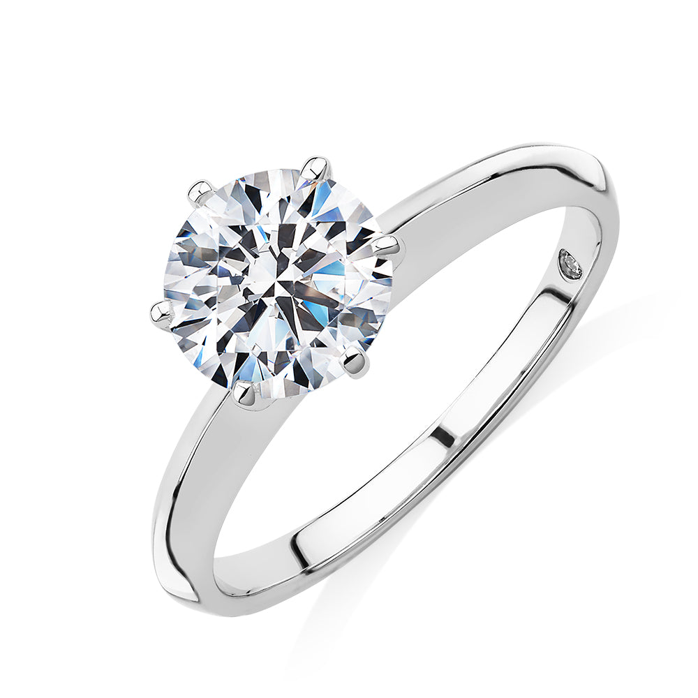Round Brilliant solitaire engagement ring with 1.5 carat* diamond simulant in 14 carat white gold