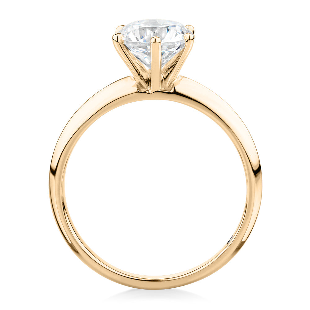 Round Brilliant solitaire engagement ring with 1.5 carat* diamond simulant in 14 carat yellow gold