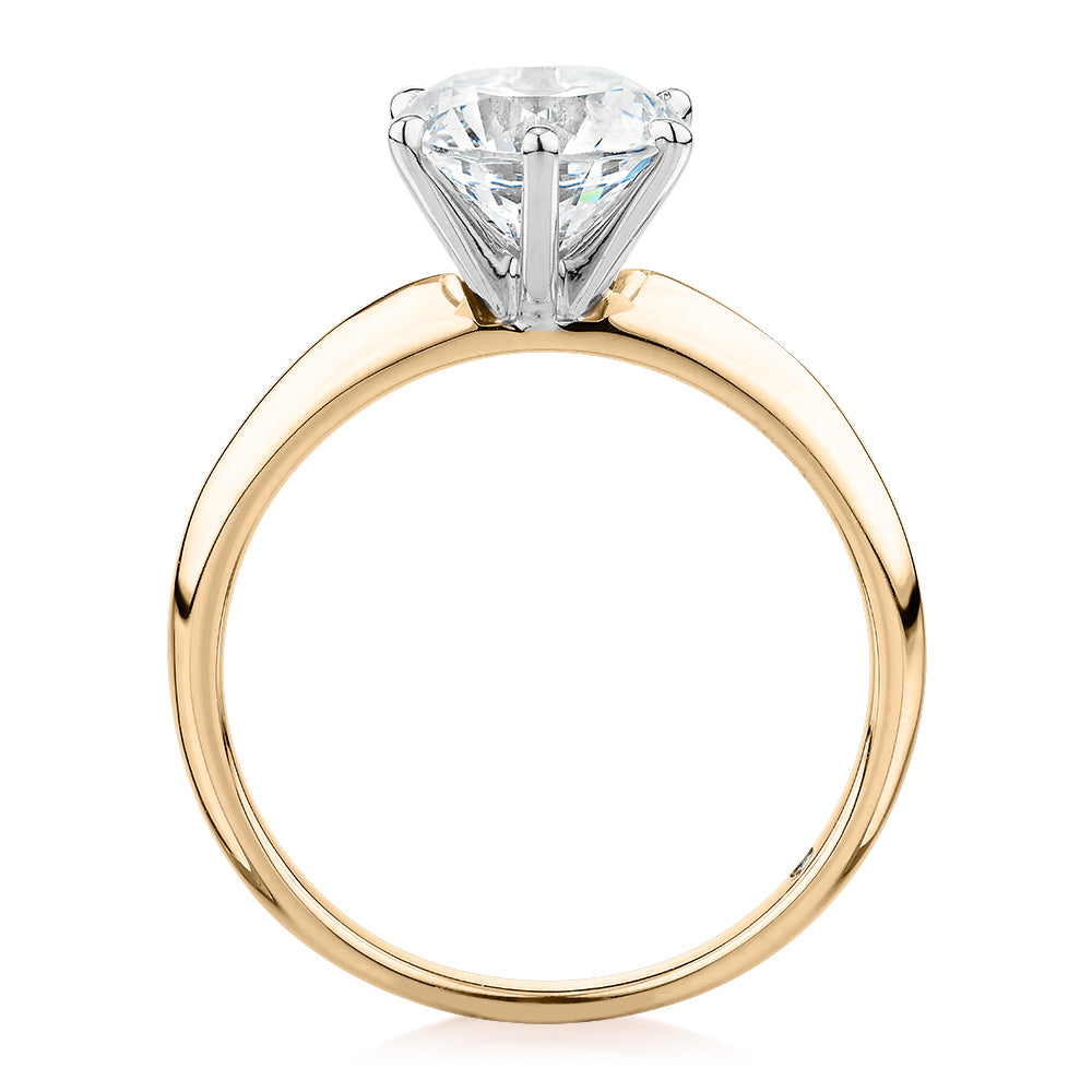 Round Brilliant solitaire engagement ring with 2 carat* diamond simulant in 14 carat yellow and white gold