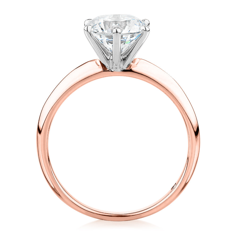Round Brilliant solitaire engagement ring with 2 carat* diamond simulant in 14 carat rose and white gold