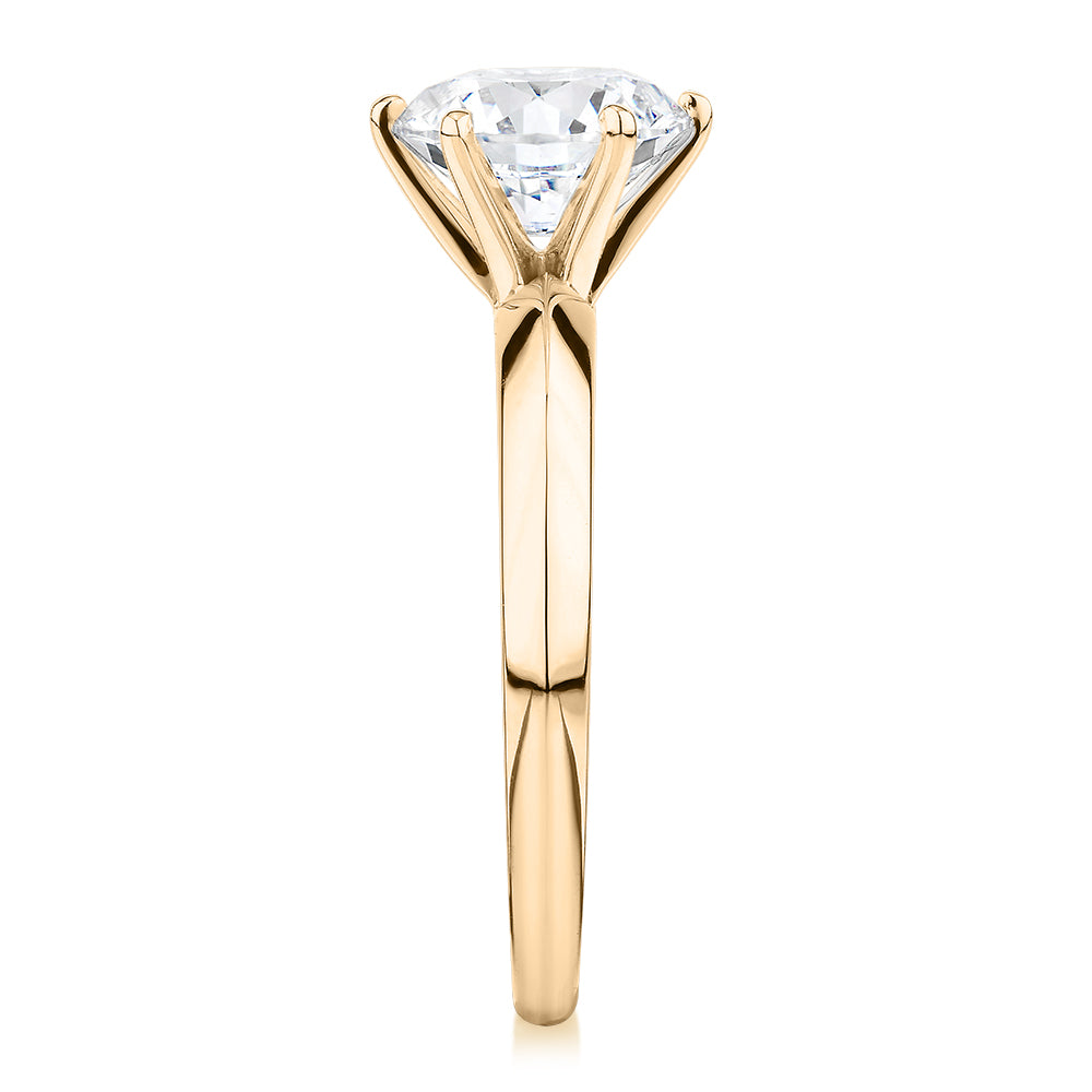 Round Brilliant solitaire engagement ring with 2 carat* diamond simulant in 14 carat yellow gold
