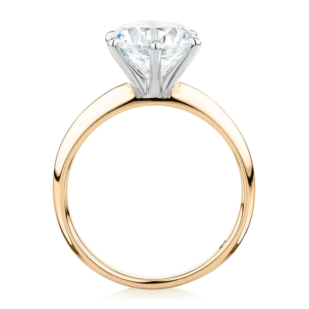 Round Brilliant solitaire engagement ring with 3 carat* diamond simulant in 14 carat yellow and white gold