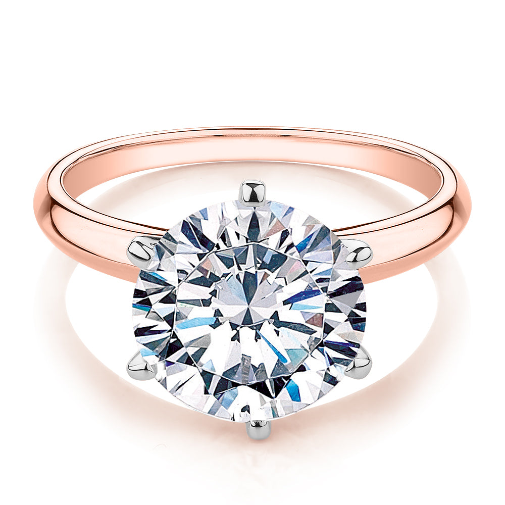 Round Brilliant solitaire engagement ring with 4 carat* diamond simulant in 14 carat rose and white gold
