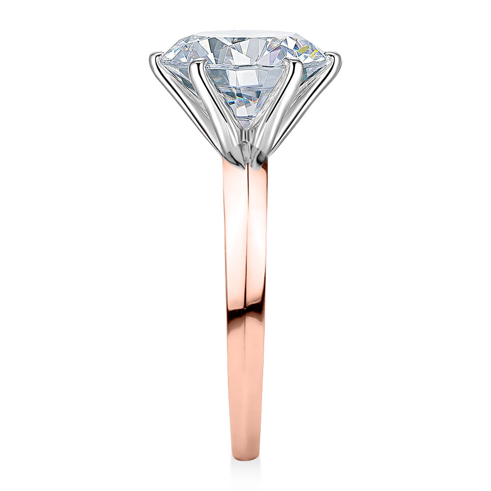Round Brilliant solitaire engagement ring with 5.49 carat* diamond simulant in 14 carat rose and white gold