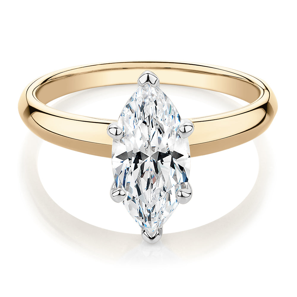 Marquise solitaire engagement ring with 1.62 carat* diamond simulant in 14 carat yellow and white gold