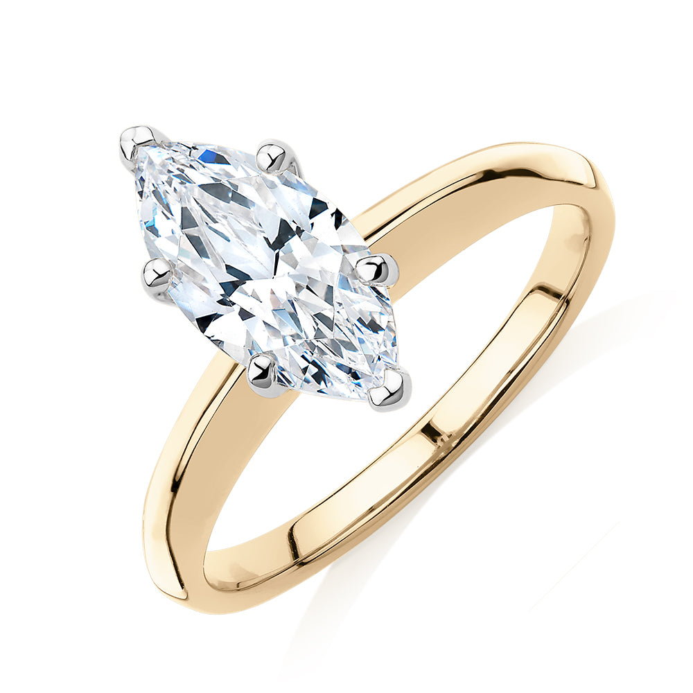 Marquise solitaire engagement ring with 1.62 carat* diamond simulant in 14 carat yellow and white gold
