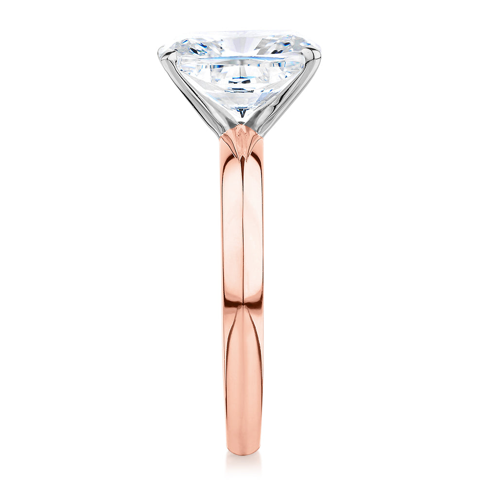 Cushion Radiant solitaire engagement ring with 3.49 carat* diamond simulant in 14 carat rose and white gold
