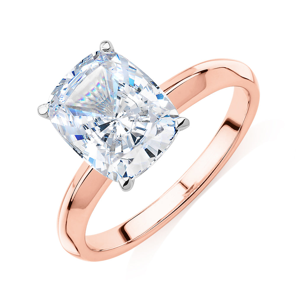 Cushion Radiant solitaire engagement ring with 3.49 carat* diamond simulant in 14 carat rose and white gold