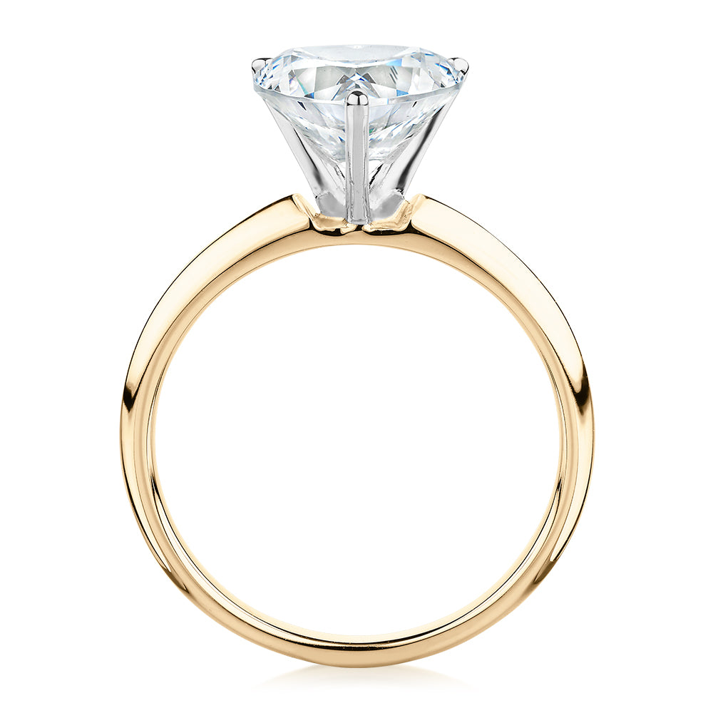 Heart solitaire engagement ring with 2.41 carat* diamond simulant in 14 carat yellow and white gold