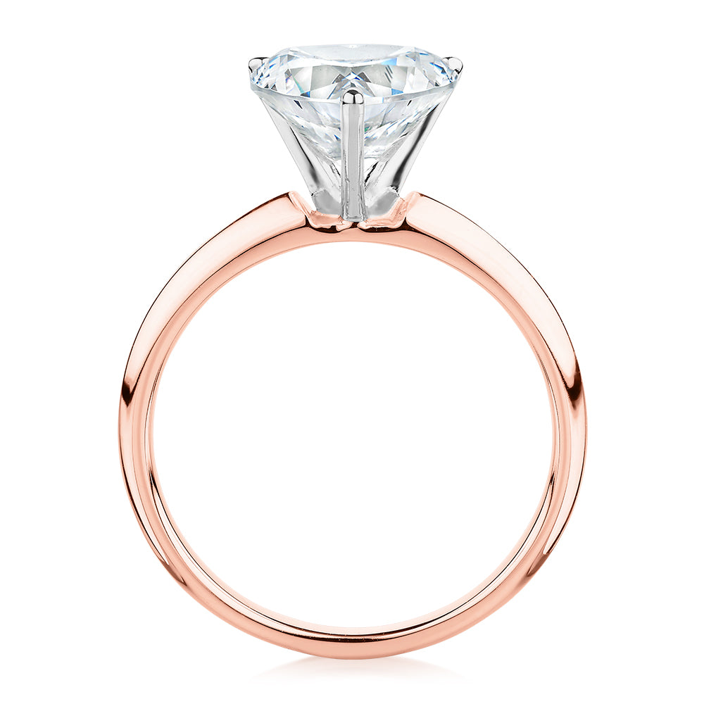 Heart solitaire engagement ring with 2.41 carat* diamond simulant in 14 carat rose and white gold